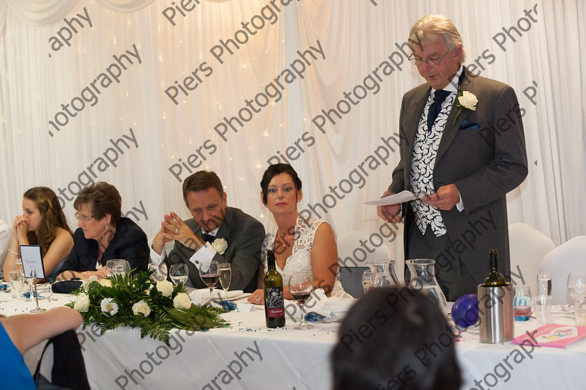 Suzi and Tim 617 
 Suzi and Tim's Wedding 
 Keywords: Buckinghamshire wedding photographer Highfield Park, Piers Photography, Wet Wedding