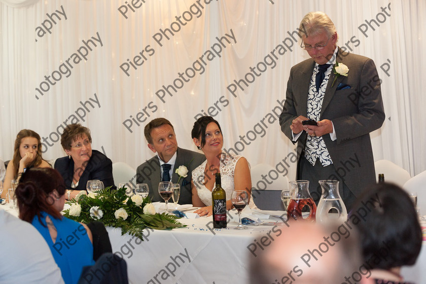 Suzi and Tim 622 
 Suzi and Tim's Wedding 
 Keywords: Buckinghamshire wedding photographer Highfield Park, Piers Photography, Wet Wedding