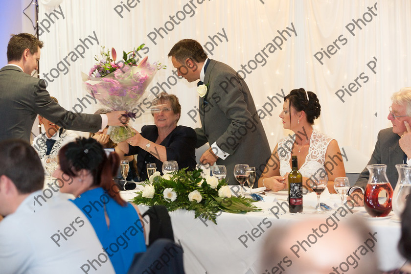 Suzi and Tim 634 
 Suzi and Tim's Wedding 
 Keywords: Buckinghamshire wedding photographer Highfield Park, Piers Photography, Wet Wedding